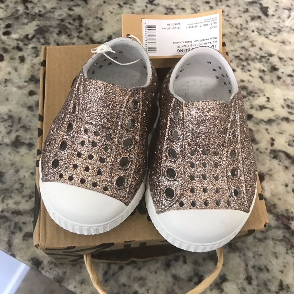 C2 Metal Bling/Shell White Natives. New in box.